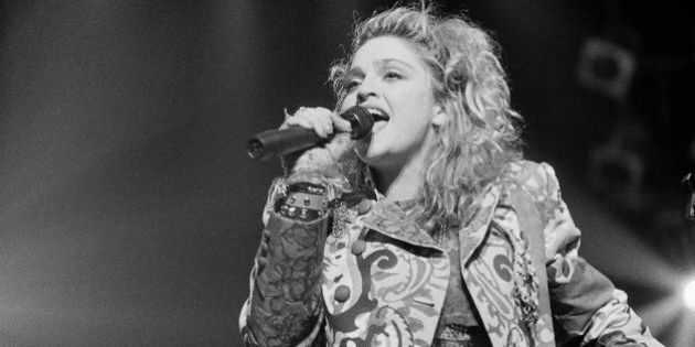 Rock star Madonna sings as she opened her first national tour at night on Wednesday, April 11, 1985 in Seattle. She is known for her million-seller records and movie âDesperately Seeking Susanâ. (AP Photo/Barry Sweet)
