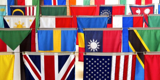 flags of many nations hang...