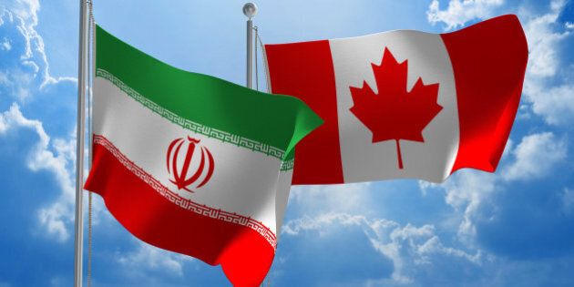 Flags from Iran and Canada flying side by side for important talks.