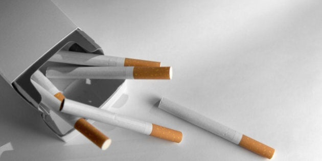 selective focus image of cigarettes against plain background