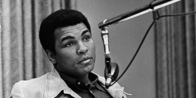 I AM THE GREATEST -- Pictured: (l-r) unknown, Muhammad Ali -- Photo by: Herb Ball/NBCU Photo Bank