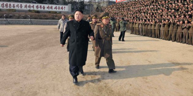 This undated picture released from North Korea's official Korean Central News Agency (KCNA) on January 12, 2014 shows North Korean leader Kim Jong-Un (front L) inspecting the command of Korean People's Army (KPA) Unit 534. AFP PHOTO / KCNA via KNS REPUBLIC OF KOREA OUT THIS PICTURE WAS MADE AVAILABLE BY A THIRD PARTY. AFP CAN NOT INDEPENDENTLY VERIFY THE AUTHENTICITY, LOCATION, DATE AND CONTENT OF THIS IMAGE. THIS PHOTO IS DISTRIBUTED EXACTLY AS RECEIVED BY AFP ---EDITORS NOTE--- RESTRICTED TO EDITORIAL USE - MANDATORY CREDIT 'AFP PHOTO / KCNA VIA KNS' - NO MARKETING NO ADVERTISING CAMPAIGNS - DISTRIBUTED AS A SERVICE TO CLIENTS (Photo credit should read KNS/AFP/Getty Images)