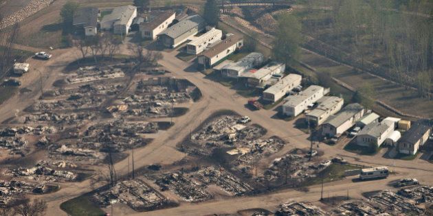 An area devastated by a wildfire is seen in an aerial view in Fort McMurray, Alberta, Canada, May 13, 2016. REUTERS/Jason Franson/Pool