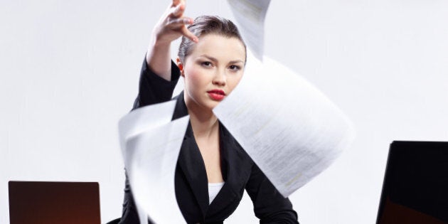 businesswoman with two laptops