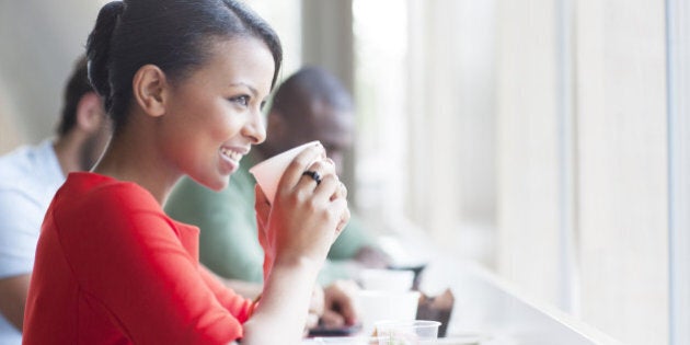 Businesswoman having lunch in cafe