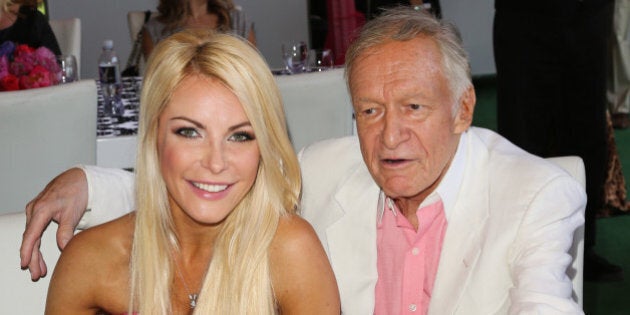 BEVERLY HILLS, CA - MAY 09: Playboy Founder Hugh Hefner (R) and his wife Playboy Playmate Crystal Hefner (L) attend the 2013 Playmate Of The Year announcement at The Playboy Mansion on May 9, 2013 in Beverly Hills, California. (Photo by Paul Archuleta/FilmMagic)