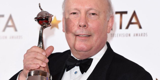 LONDON, ENGLAND - JANUARY 21: Writer Julian Fellowes, winner of the Drama National Television award, poses in the winners room at the National Television Awards at 02 Arena on January 21, 2015 in London, England. (Photo by Karwai Tang/WireImage)