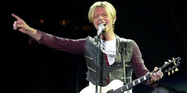 British singer David Bowie performs on stage during his concert at the Sportpaleis of Antwerp, 05 November 2003. (Photo credit should read PETER DE VEOCHT/AFP/Getty Images)