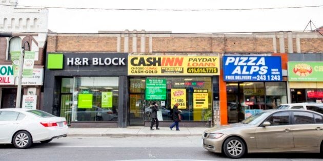 TORONTO, ON - FEBRUARY 27 -A payday loan store near the intersection of Weston Road and Lawrence avenue west. ACORN Toronto is hosting a forum to discuss its campaign to get the City of Toronto to create a minimum distance separation bylaw between payday loans outlets to limit the number that can exist in certain areas. (Carlos Osorio/Toronto Star via Getty Images)