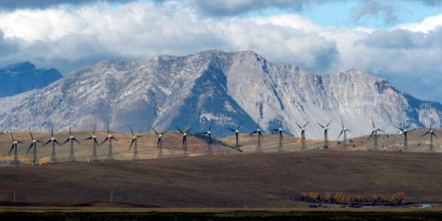 Windmills generate electricity in the windy rolling foothills of the Rocky Mountains near the town of Pincher Creek, Alberta, September 27, 2010. The non-polluting source of renewable energy is fed into the provincial electrical grid that powers Southern Alberta industries and residences. REUTERS/Todd Korol (CANADA - Tags: ENVIRONMENT BUSINESS ENERGY)