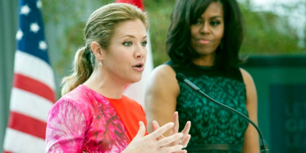 First lady Michelle Obama looks on as Sophie Grégoire-Trudeau, wife of Canadian Prime Minister Justin Trudeau, speaks during a program at the U.S. Institute of Peace in Washington, Thursday, March 10, 2016, to highlight Let Girls Learn efforts and raise awareness for global girl's education. (AP Photo/Cliff Owen)