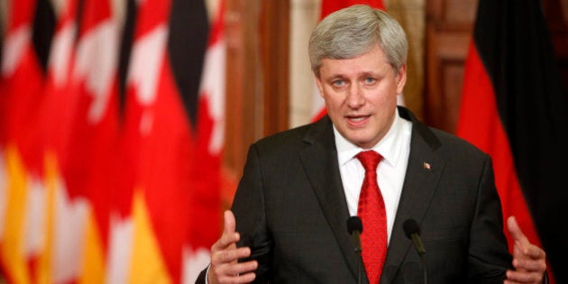 OTTAWA, CANADA -FEBRUARY 09: Canada's Prime Minister Stephen Harper addresses media alongside German Chancellor Angela Merkel (not seen) on Parliament Hill in Ottawa, Canada on February 9, 2015. (Photo by Cole Leighton/Anadolu Agency/Getty Images)