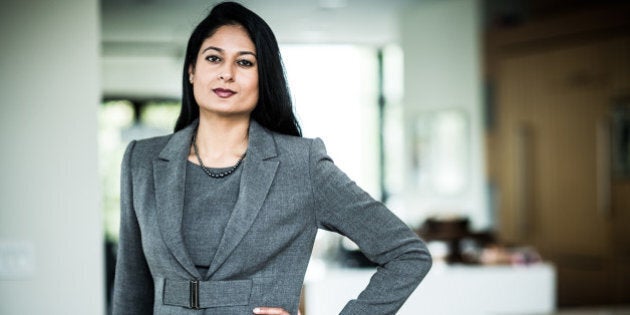 businesswoman looking at camera