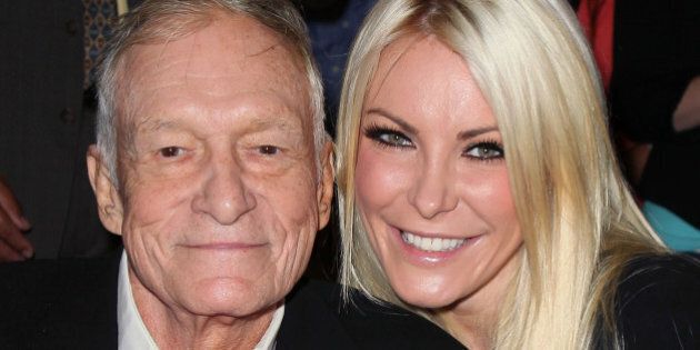 BEVERLY HILLS, CA - AUGUST 07: Playboy founder Hugh Hefner (L) and TV personality Crystal Harris attend the Beverly Hills City Council and Playboy Enterprises, Inc.'s celebration of the return of Playboy headquarters to Beverly Hills on August 7, 2012 in Beverly Hills, California. (Photo by David Livingston/Getty Images)
