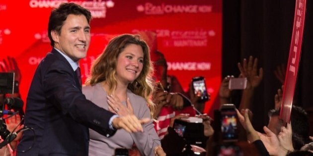 Canadian Liberal Party leader Justin Trudeau and his wife Sophie greet supporters in Montreal on October 20, 2015 after winning the general elections. AFP PHOTO/NICHOLAS KAMM (Photo credit should read NICHOLAS KAMM/AFP/Getty Images)