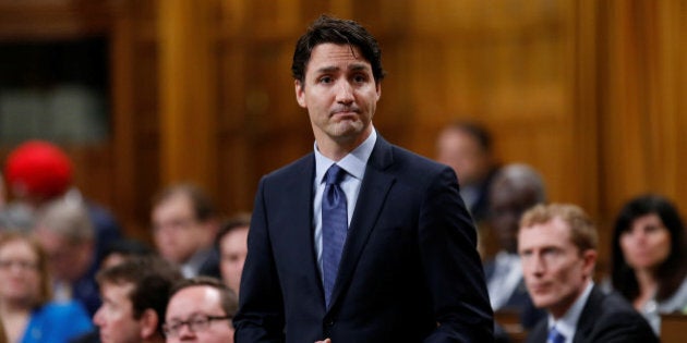 REFILE - TYPOCanada's Prime Minister Justin Trudeau pauses while responding to questions after delivering an apology in the House of Commons on Parliament Hill in Ottawa, Ontario, Canada, May 19, 2016 following a physical altercation the previous day. REUTERS/Chris Wattie