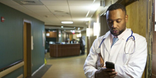 African American doctor standing in hospital