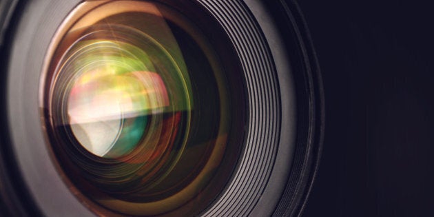 Camera lens detail, front glass of wide angle photography DSLR camera lens, macro shot