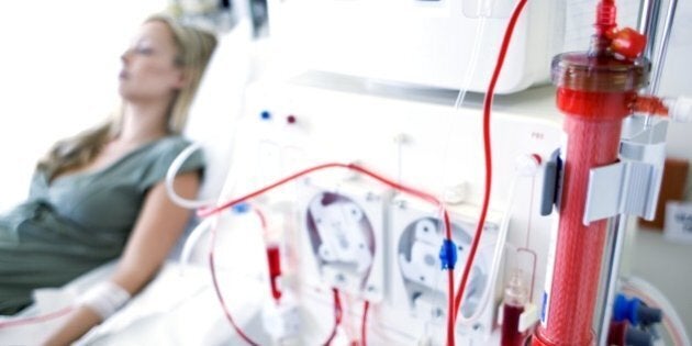 Woman getting kidney dialysis