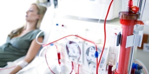 Woman getting kidney dialysis