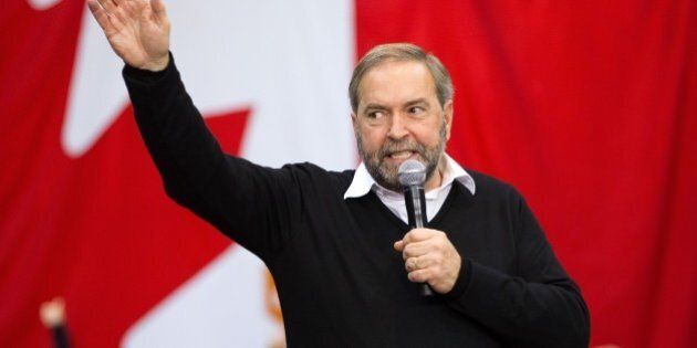 NDP leader Thomas Mulcair speaks at a campaign rally in London, Ontario October 4, 2015. New polling showed the former frontrunner in Canada's legislative elections could finish third over its opposition to a popular niqab ban, as political leaders squared off in a final debate October 2. The race is still too close to call, with the rivals sparring over taxes, trade negotiations, the Syrian refugee crisis, air strikes against the Islamic State group, and upcoming Paris climate talks.Thomas Mulcair's New Democrats jumped into the lead at the start of the race in July and held it through most of the campaign. AFP PHOTO/GEOFF ROBINS (Photo credit should read GEOFF ROBINS/AFP/Getty Images)
