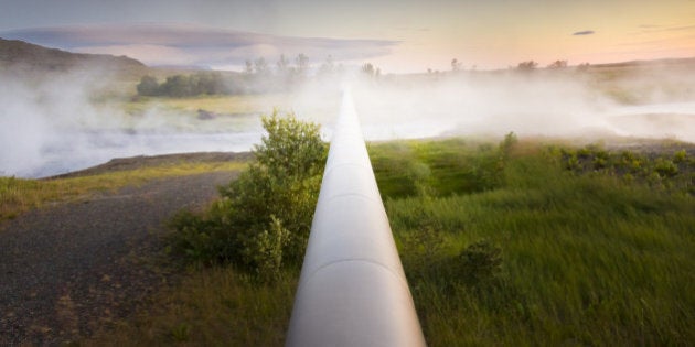 large heat pipeline disappearing at vanishing point in thermal steam