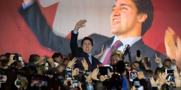 Canadian Liberal Party leader Justin Trudeau arrives on stage in Montreal on October 20, 2015 after winning the general elections. AFP PHOTO/NICHOLAS KAMM (Photo credit should read NICHOLAS KAMM/AFP/Getty Images)