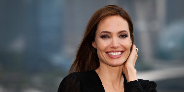 Angelina Jolie looks classy as ever in black pantsuit while