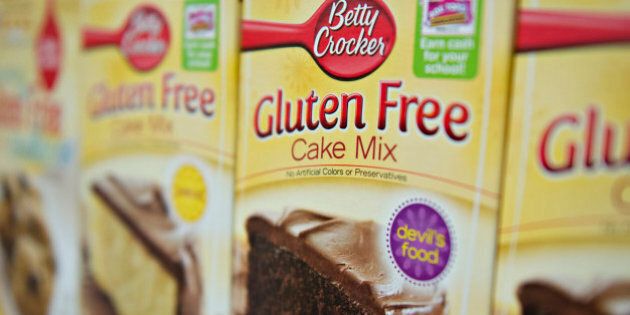 'Gluten Free' appears on the packaging for General Mills Inc. Betty Crocker brand cake mix displayed for sale at a supermarket in Princeton, Illinois, U.S., on Wednesday, Aug. 7, 2013. The Food and Drug Administration (FDA) is issuing a final rule to define the term 'gluten-free' when voluntarily used in food labeling, according to a notice published in the Aug. 5 Federal Register. Photographer: Daniel Acker/Bloomberg via Getty Images