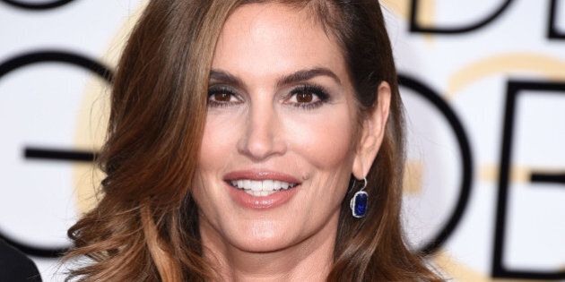 BEVERLY HILLS, CA - JANUARY 11: Cindy Crawford arrives at the 72nd Annual Golden Globe Awards at The Beverly Hilton Hotel on January 11, 2015 in Beverly Hills, California. (Photo by Steve Granitz/WireImage)