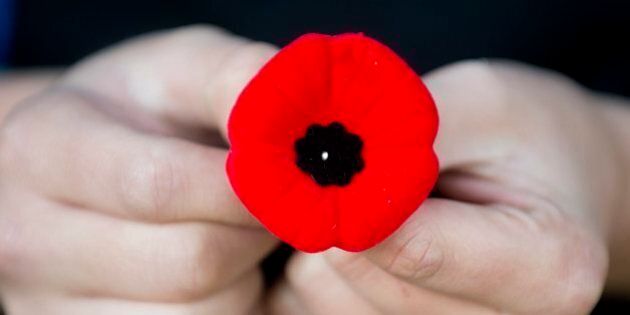 A poppy is the traditional symbol of remembrance in Canada and other countries in the British Commonwealth.