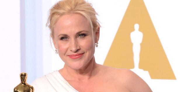 HOLLYWOOD, CA - FEBRUARY 22: Actress Patricia Arquette, with the award for best actress in a supporting role for 'Boyhood' poses in the press room during the 87th Annual Academy Awards at Loews Hollywood Hotel on February 22, 2015 in Hollywood, California. (Photo by C Flanigan/Getty Images)