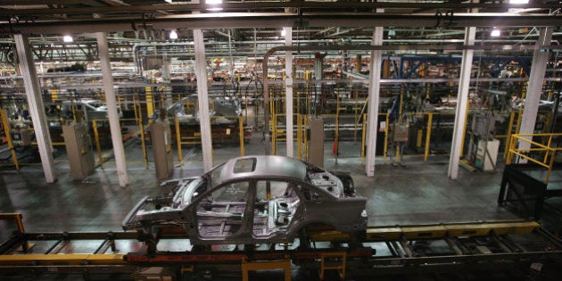 CHICAGO - JUNE 22: A Ford vehicle during the early phases of construction rides along the assembly line at the Torrence Avenue Ford Assembly Plant June 22, 2007 in Chicago, Illinois. Ford builds the new Ford Taurus, Taurus X crossover vehicle and the Mercury Sable at the plant. Nearly 3,000 people are currently employed at the facility which was first opened in 1924 to build the Model T. (Photo by Scott Olson/Getty Images)