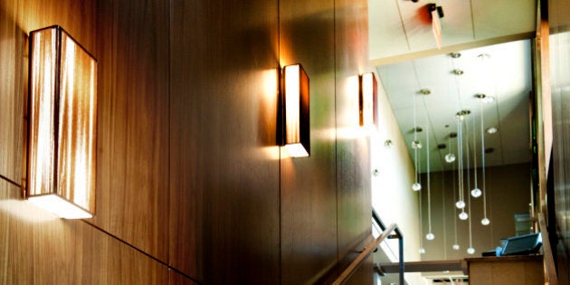 Washington, DC - March, 27: Art glass sconces mounted on wooden walls in a staircase leading up to the upper level bar in the historic and newly refurbished Howard theater on March, 27, 2012 in Washington, DC. (Photo by Bill O'Leary/The Washington Post via Getty Images)