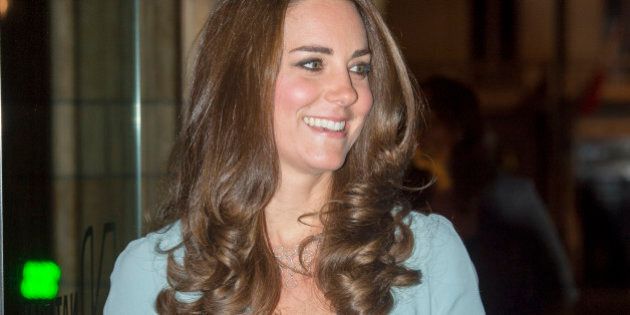 Britain's Catherine Duchess of Cambridge arrives at the Natural History Museum in London, Tuesday, Oct. 21, 2014 for the Wildlife Photographer of the Year 2014 awards ceremony. (AP Photo/Arthur Edwards, pool)