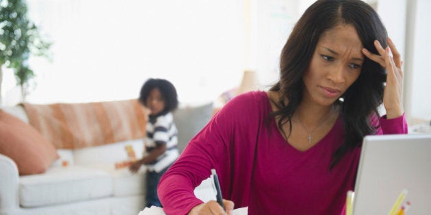 Frustrated African American woman working from home