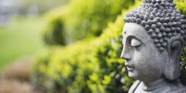 Statue of Buddha in a garden