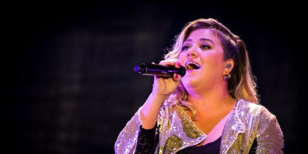 LAS VEGAS, NV - August 15: ***HOUSE COVERAGE*** Kelly Clarkson performs at Mandalay Bay Events Center at Mandalay Bay Resort in Las Vegas, NV on August 15, 2015. Credit: Erik Kabik Photography/ MediaPunch/IPX