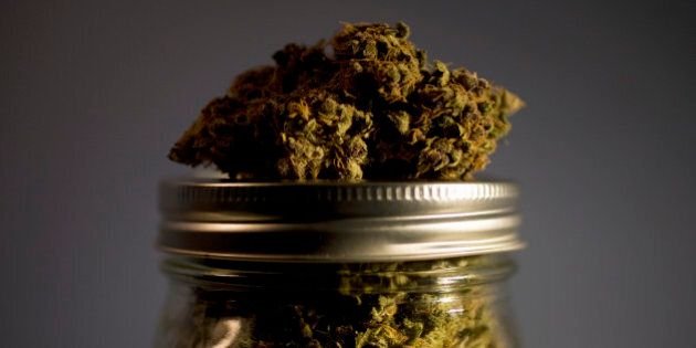 Marijuana strain on top of jar full of strains