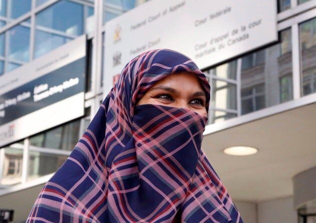 Zunera Ishaq talks to reporters outside the Federal Court of Appeal after her case was heard in Ottawa on Sept. 15, 2015.