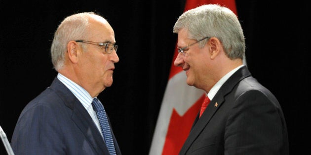 TORONTO, ON - AUGUST 29 - Prime Minister Stephen Harper Thursday announced legislation to toughen child sexploitation laws. Following his speech, Harper (right) greets Minister of Veteran Affairs, Julian Fantino.He met with ministers and child advocates at the Banbury Community Centre in the York Mills and Leslie area and then made a speech at the International Plaza hotel near the airport. (Richard Lautens/Toronto Star via Getty Images)