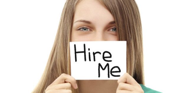 Girl asking to get hired Sign saying 'Hire me'