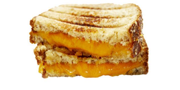 Two halves of grilled cheese sandwich