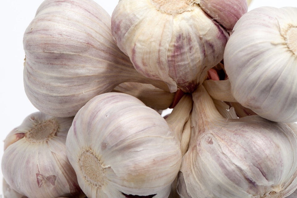 Chew Raw Garlic Cloves