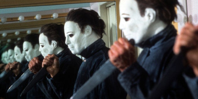 George P Wilbur holds a knife in a scene from the film 'Halloween 4: The Return Of Michael Myers', 1988. (Photo by Galaxy International Releasing/Getty Images)