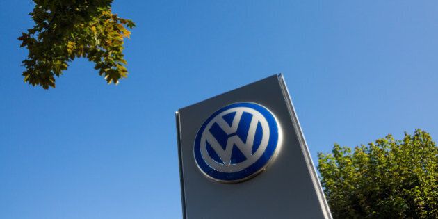 LONDON, ENGLAND - SEPTEMBER 25: The logo of German manufacturer Volkswagen is seen outside a dealership in Battersea on September 25, 2015 in London, England. The Department for Transport's Vehicle Certification Agency, the UK's national approval authority for new road vehicles, has announced that it will re-run laboratory tests on engines and compare the results with emissions from on-the-road tests in the wake of the VW test-rigging scandal. The German car manufacturer has admitted selling vehicles in the US with diesel engines that could detect when they were being tested for emission, changing the vehicles performance accordingly in order to improve results. (Photo by Rob Stothard/Getty Images)