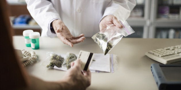 Pharmacist and customer with medical marijuana