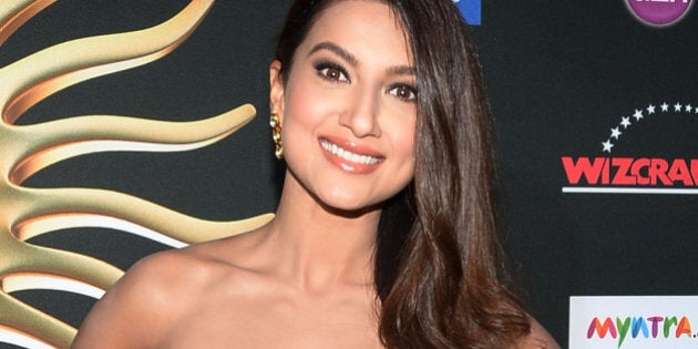 TAMPA, FL - APRIL 26: Bollywood model and actress Gauhar Khan arrives at the IIFA Awards at Raymond James Stadium on April 26, 2014 in Tampa, Florida. (Photo by Gustavo Caballero/Getty Images)