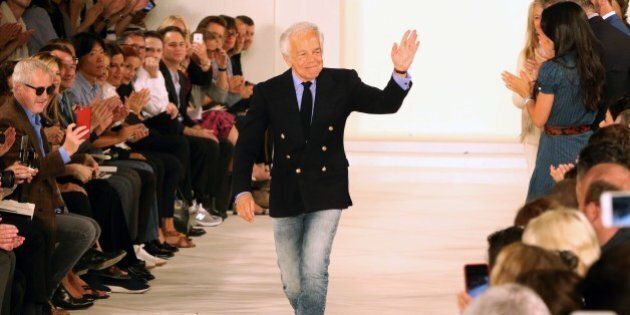 Designer Ralph Lauren is applauded by the audience after his presentation at New York Fashion Week in New York on September 17, 2015. AFP PHOTO/TREVOR COLLENS (Photo credit should read TREVOR COLLENS/AFP/Getty Images)