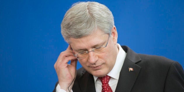 BERLIN, GERMANY - MARCH 27: Stephen Harper, Prime Minister of Canada, speaks to members of the media during a press conference in the Federal Chancellery on March 27, 2014 in Berlin, Germany. (Photo by Thomas Koehler/Photothek via Getty Images)